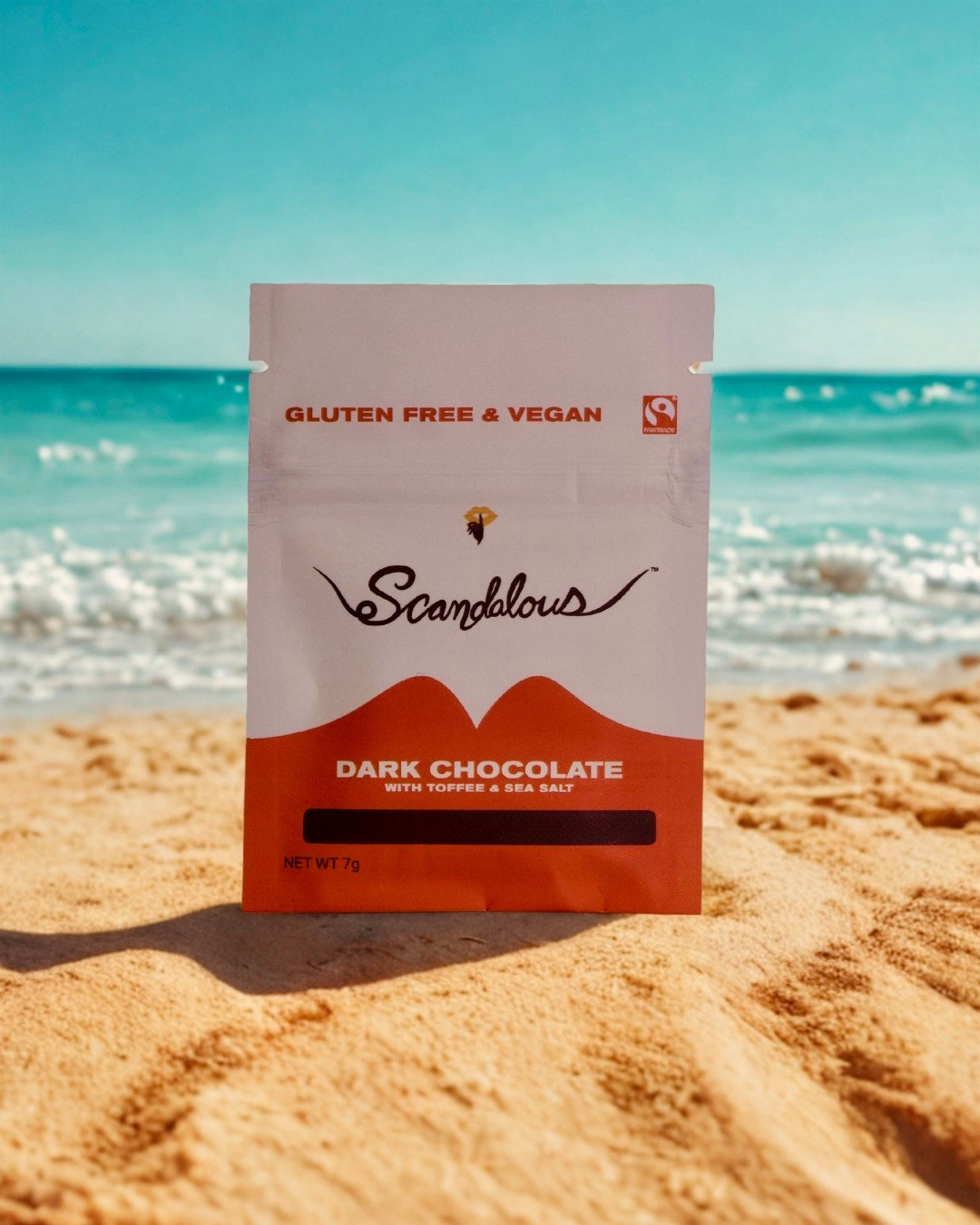Scandalous Chocolates product staged on a beach